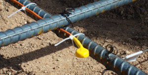 sensor-in-concrete-orange-highres COMMAND Center™ Sensor attached to rebar